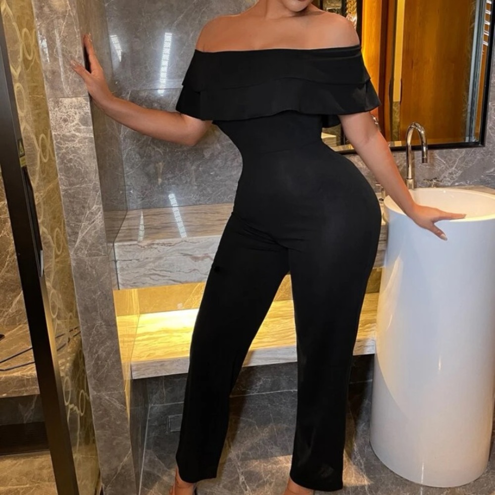 COPY - Very elegant and classy black, off the shoulders one piece jumpsuit. Nev…